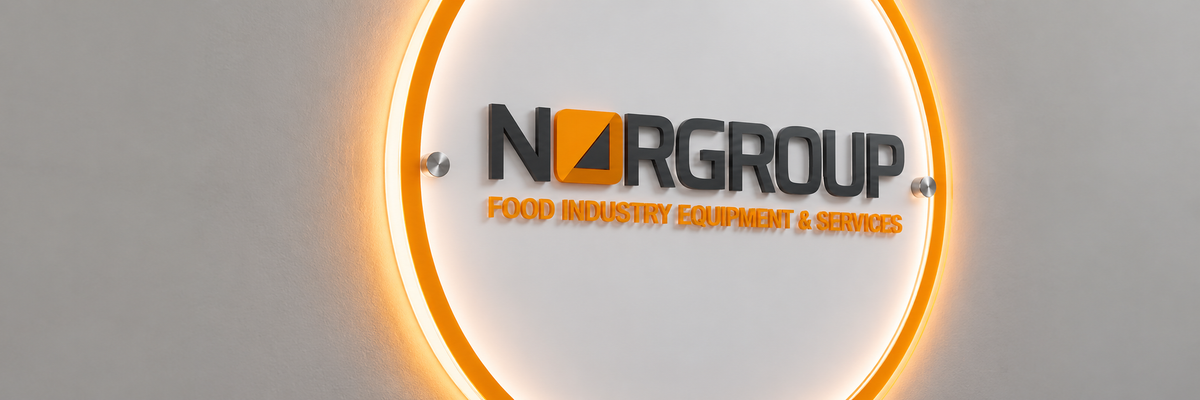 Norgroup acrylic logo panel with a warm halo lighting effect.